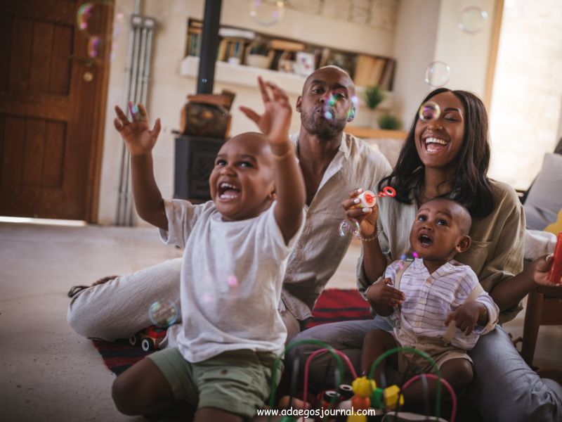 Family-laughing-together-in-the-living-room