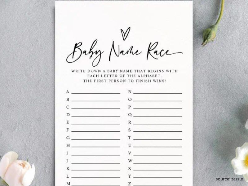 Guests writing baby names during a fun baby shower name game activity