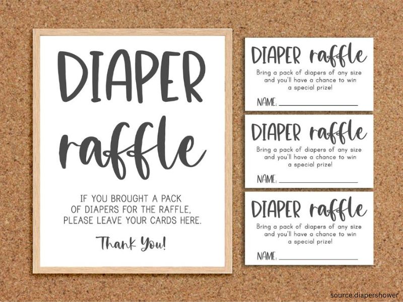 Baby shower diaper raffle setup with tickets and gift prize on display table