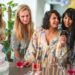Guests laughing and enjoying fun baby shower games during a celebration