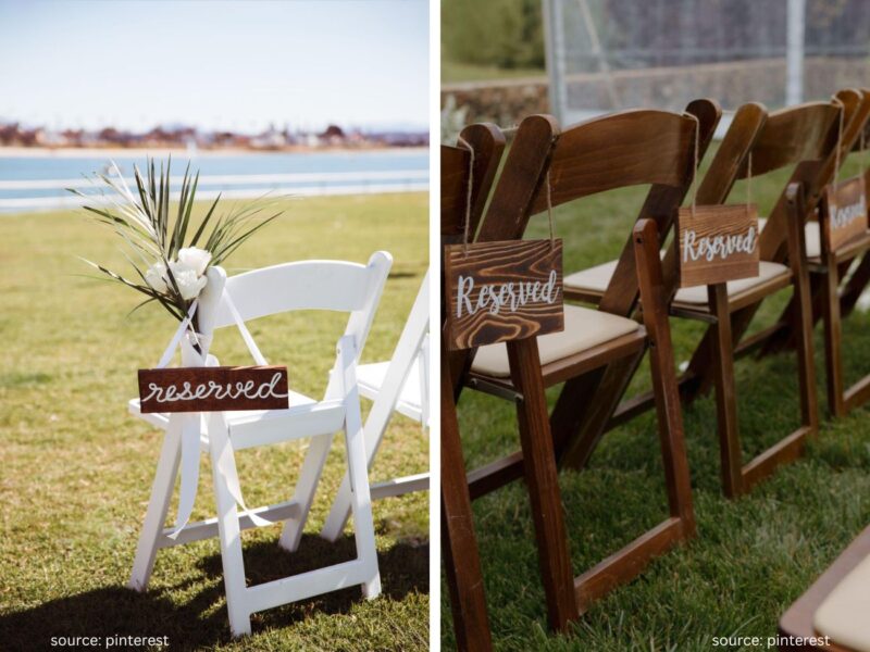 Reserved seating signs attached to ceremony chairs for family members
