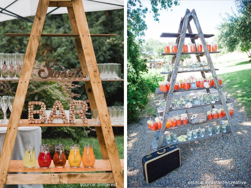 Rustic wooden ladder drink station styled for a backyard wedding with flowers and beverages.