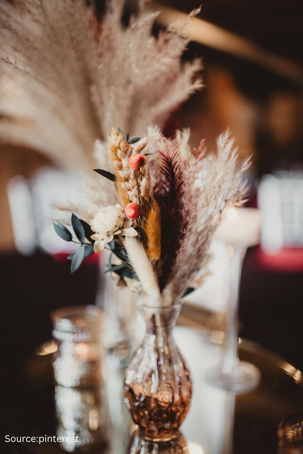 Dried and preserved flower wedding centerpiece featuring pampas grass and neutral tones