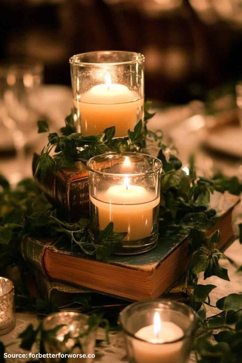 Vintage book stack cheap wedding centerpieces topped with candles for a romantic literary-inspired reception.