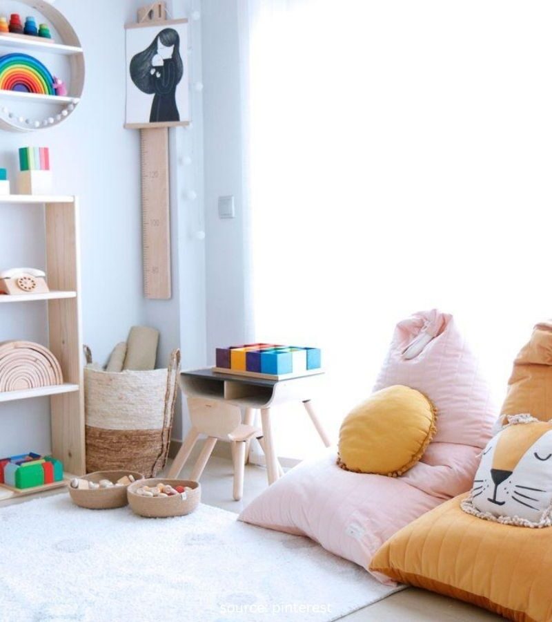 Realistic kids playroom with organized toys, low shelves, baskets, and a cozy play area