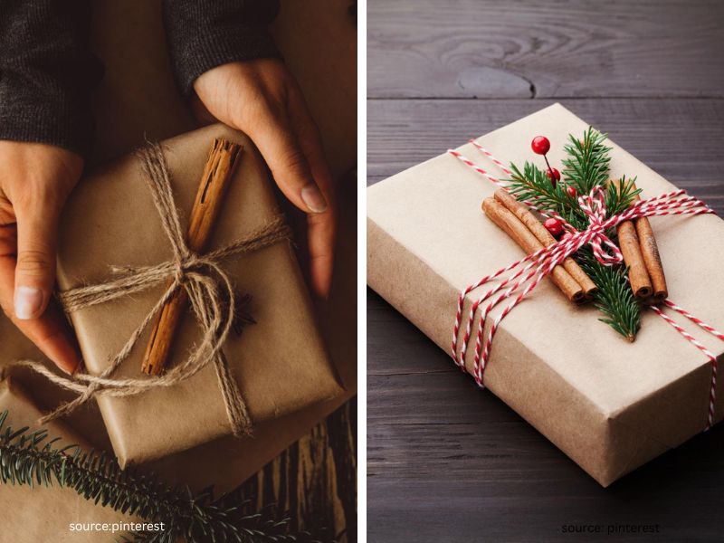 Kraft paper Christmas gift decorated with cinnamon sticks, greenery, and twine