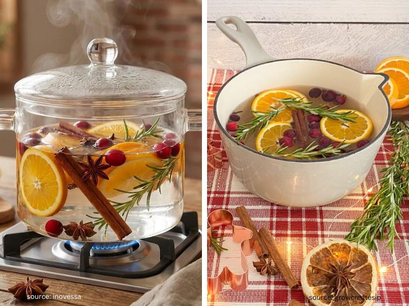 Christmas simmer pot with orange slices cinnamon and cloves on a kitchen stove